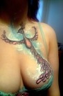 Thumbnail that leads to photos of body art